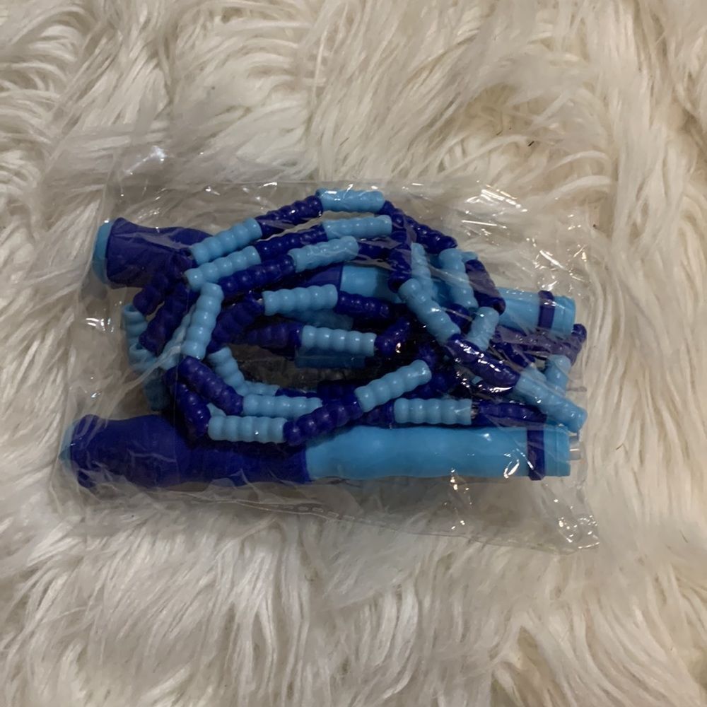Skipping Ropes:  one blue/one pink beaded jump ropes adjustable